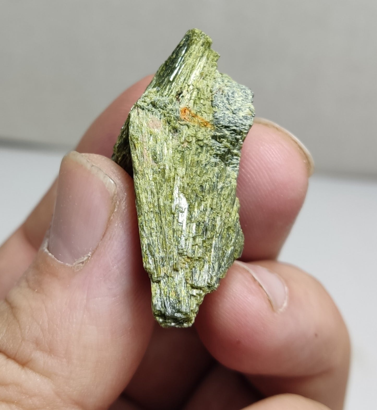 An aesthetic specimen of epidote crystal spray type 22 grams