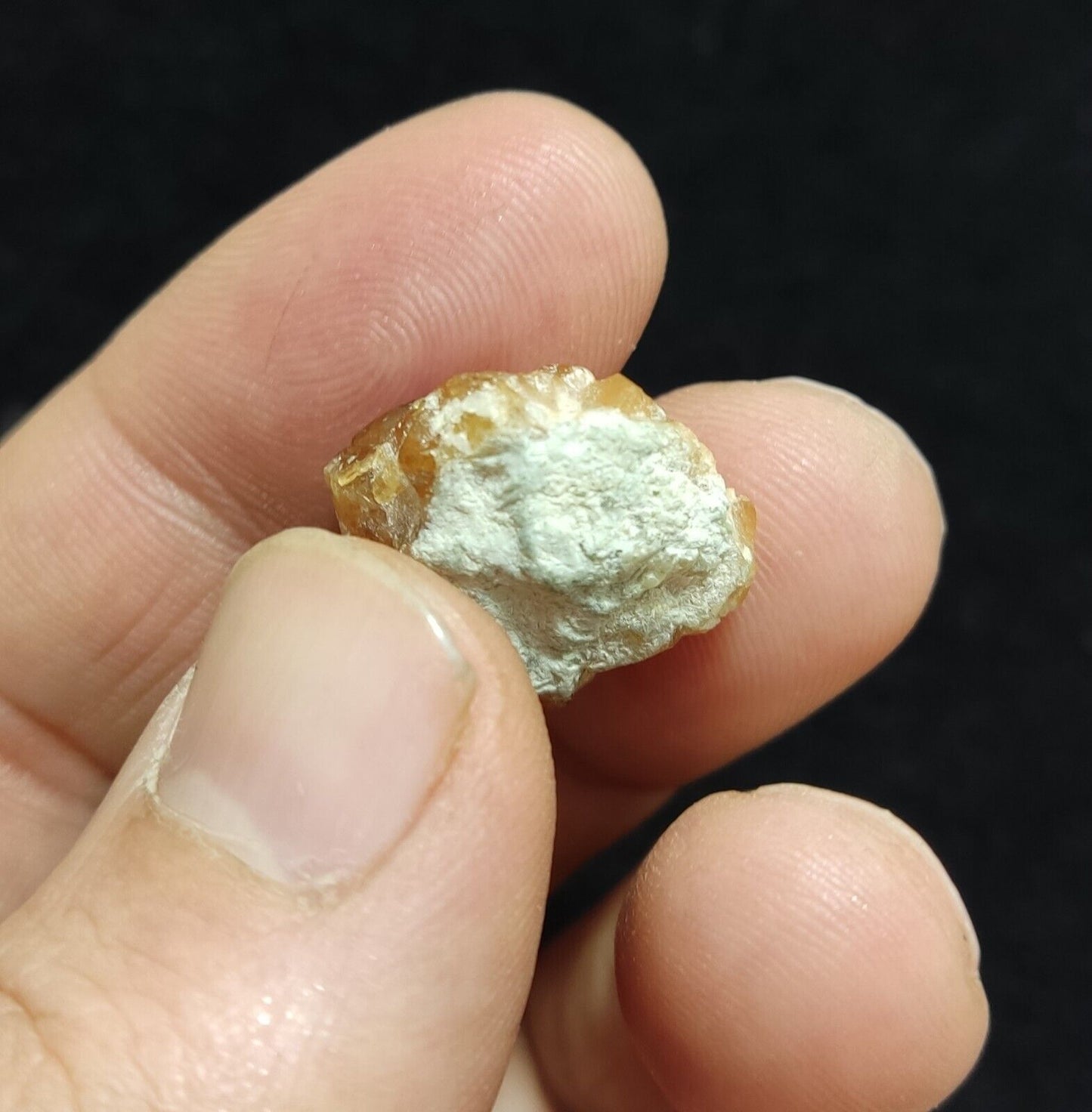 A selection of three garnet variety hessonite crystals 14.8 grams