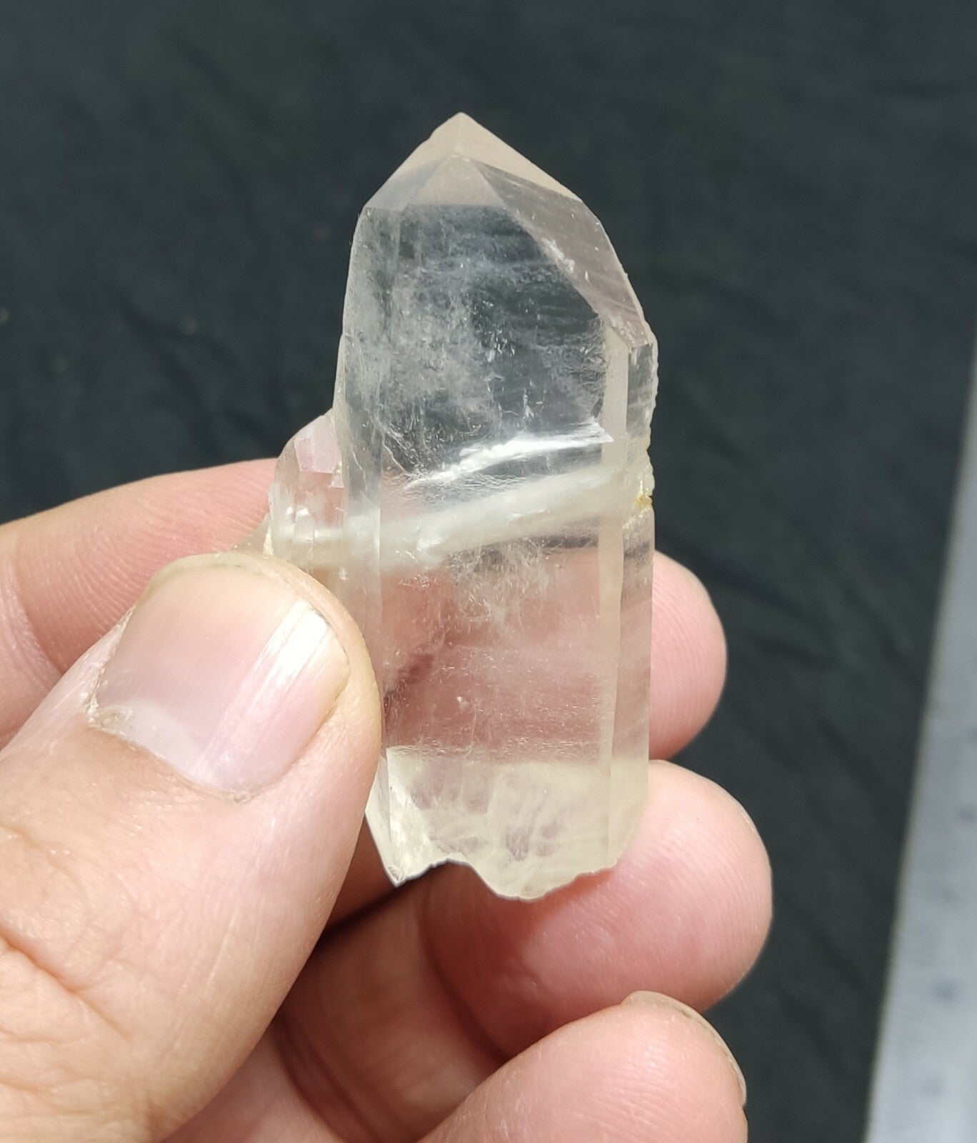 An amazing specimen of terminated Quartz crystal with unique inclusions 18 grams