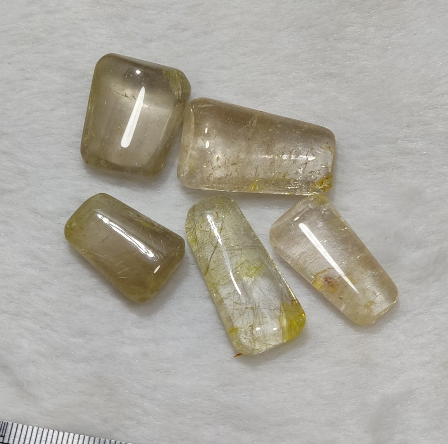 An amazing lot of Rutilated polished quartz tumbles 45 grams