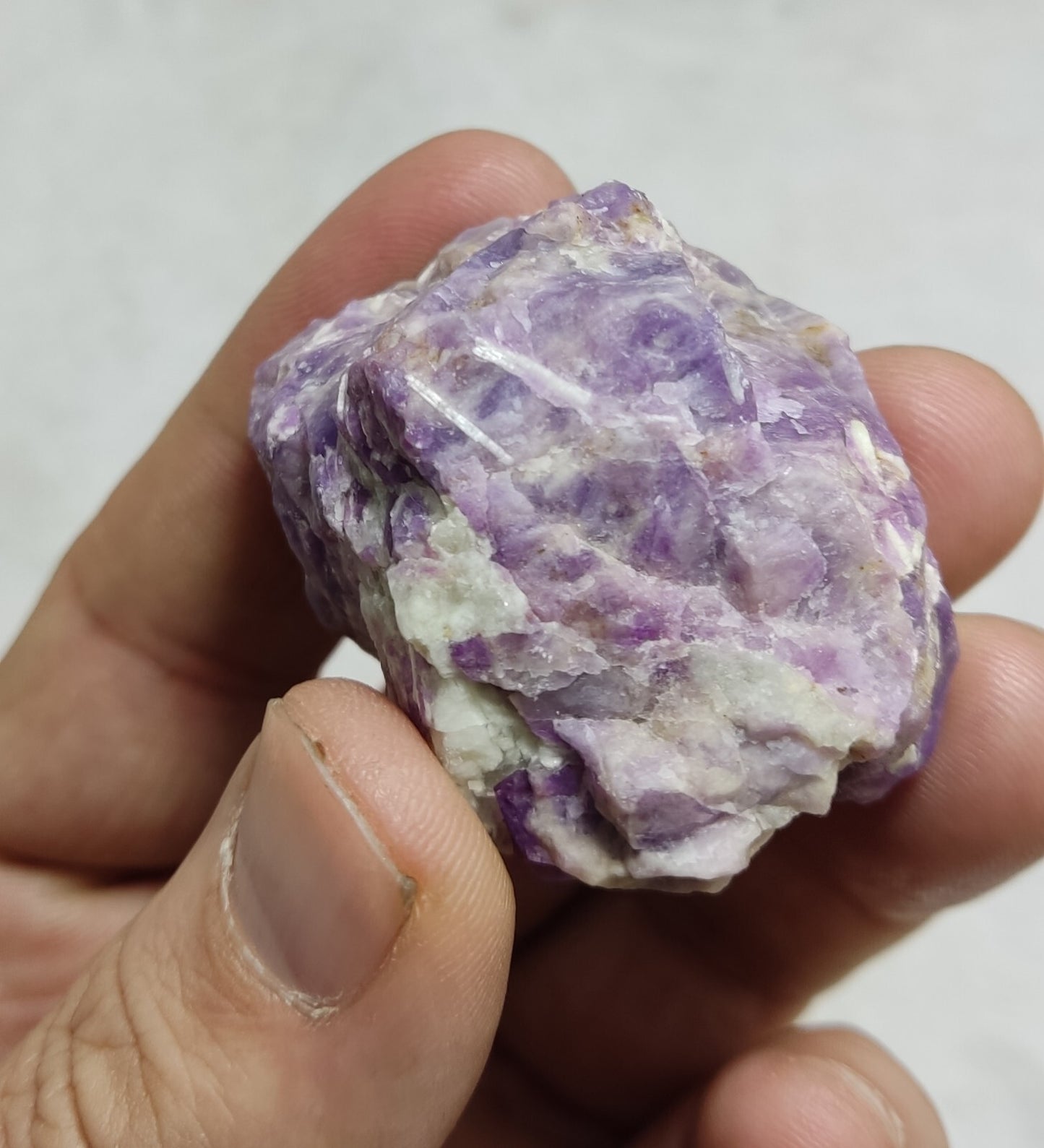 An amazing specimen of fluorescent rough hackmanite chunk 51 grams