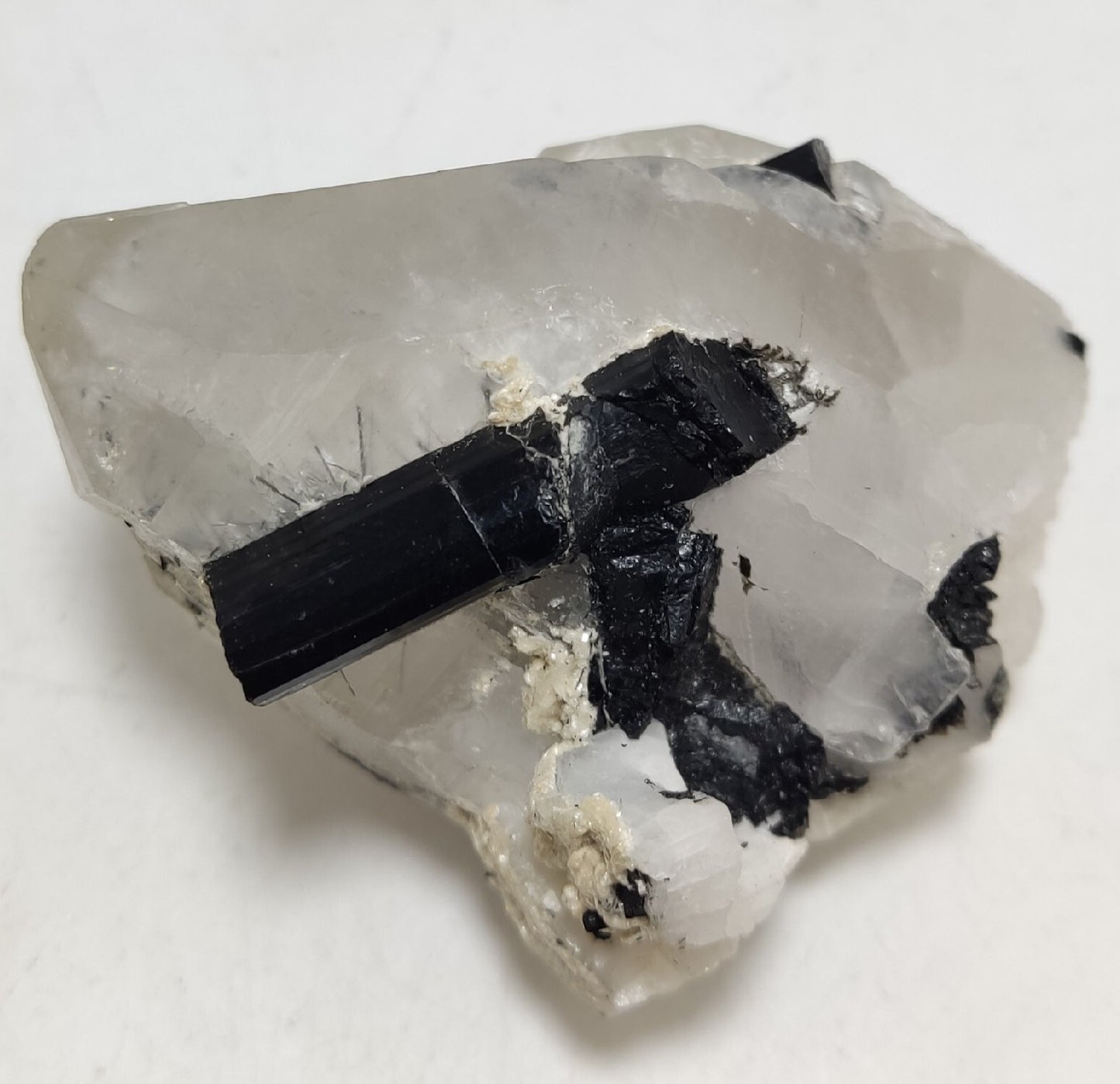 Natural quartz crystal with black tourmaline 129 grams