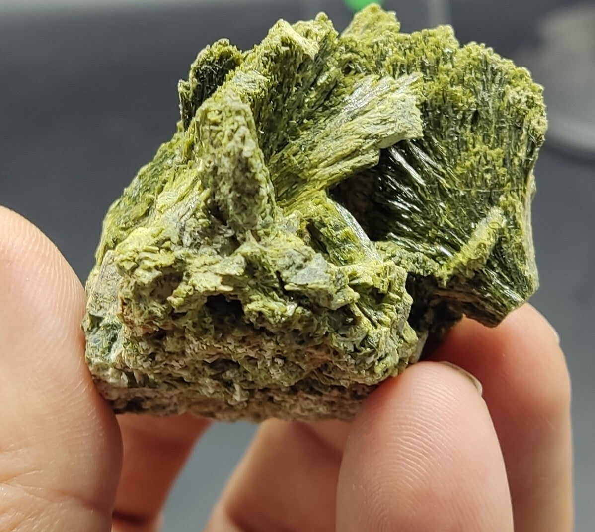 An aesthetic specimen of epidote crystal spray type 107 grams