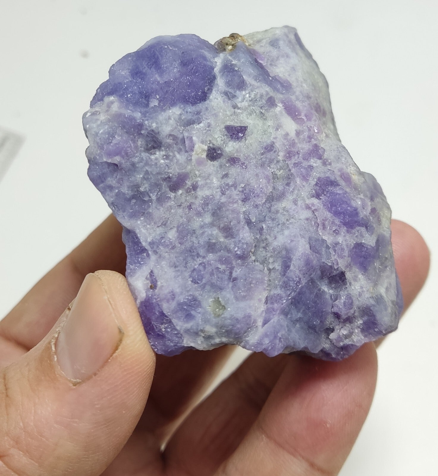 An amazing specimen of hackmanite highly Tenebrescent 143 grams