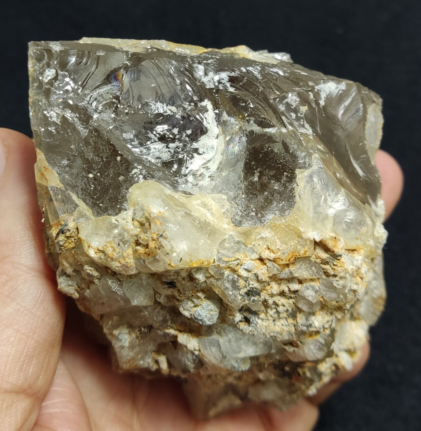 An Aesthetic terminated Quartz floater with rutiles and hematite 399 grams