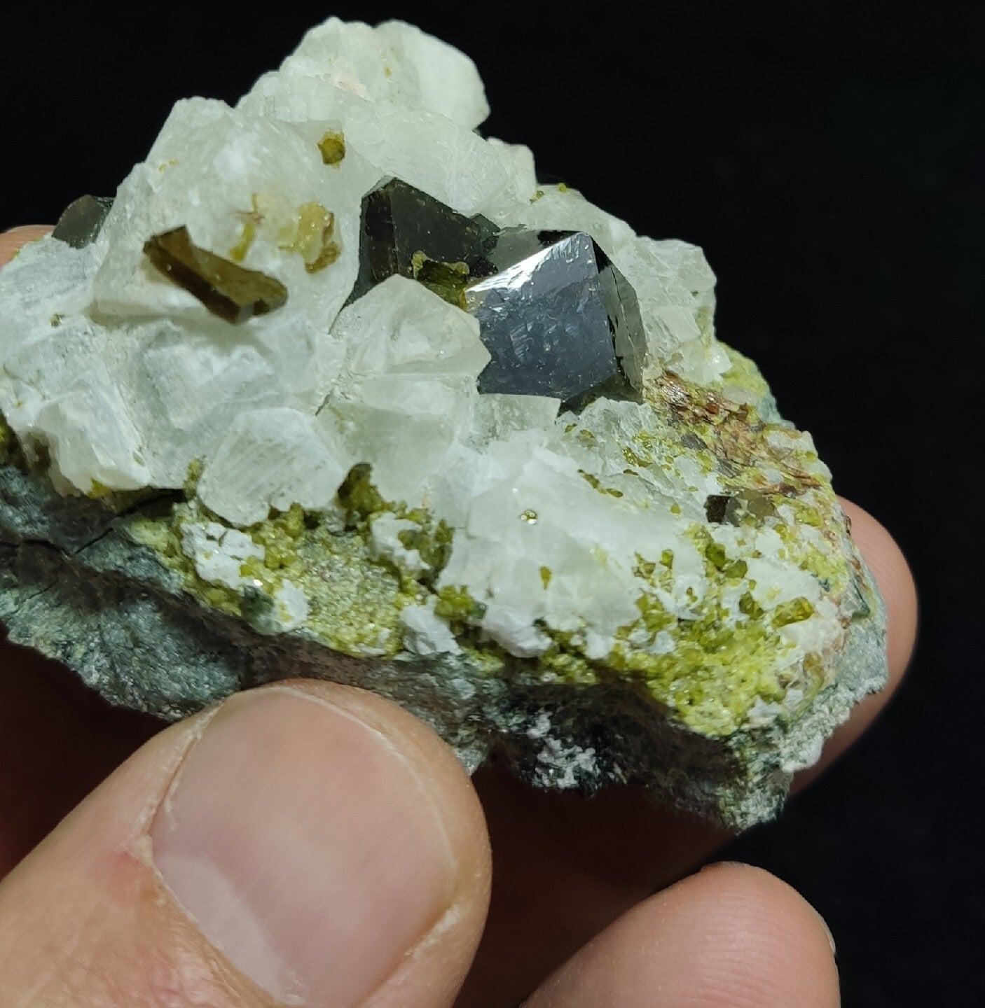 Andradite garnets on matrix with epidote and calcite 91 grams