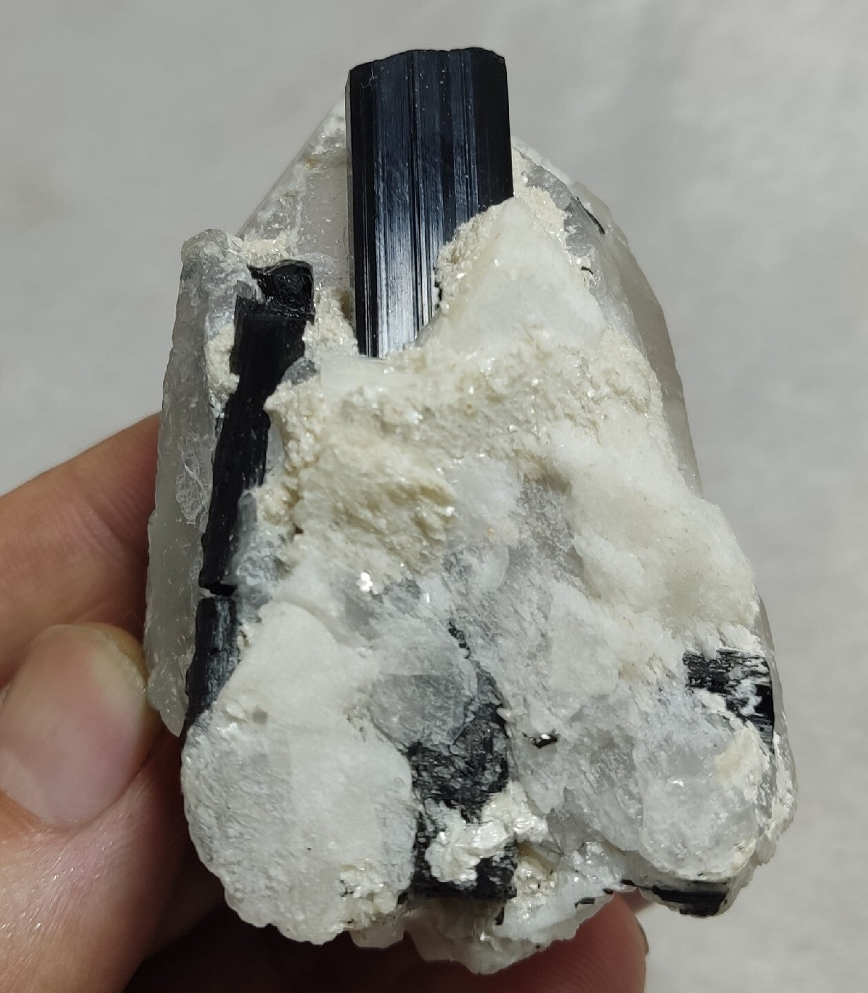 Natural quartz crystal with black tourmaline 145 grams