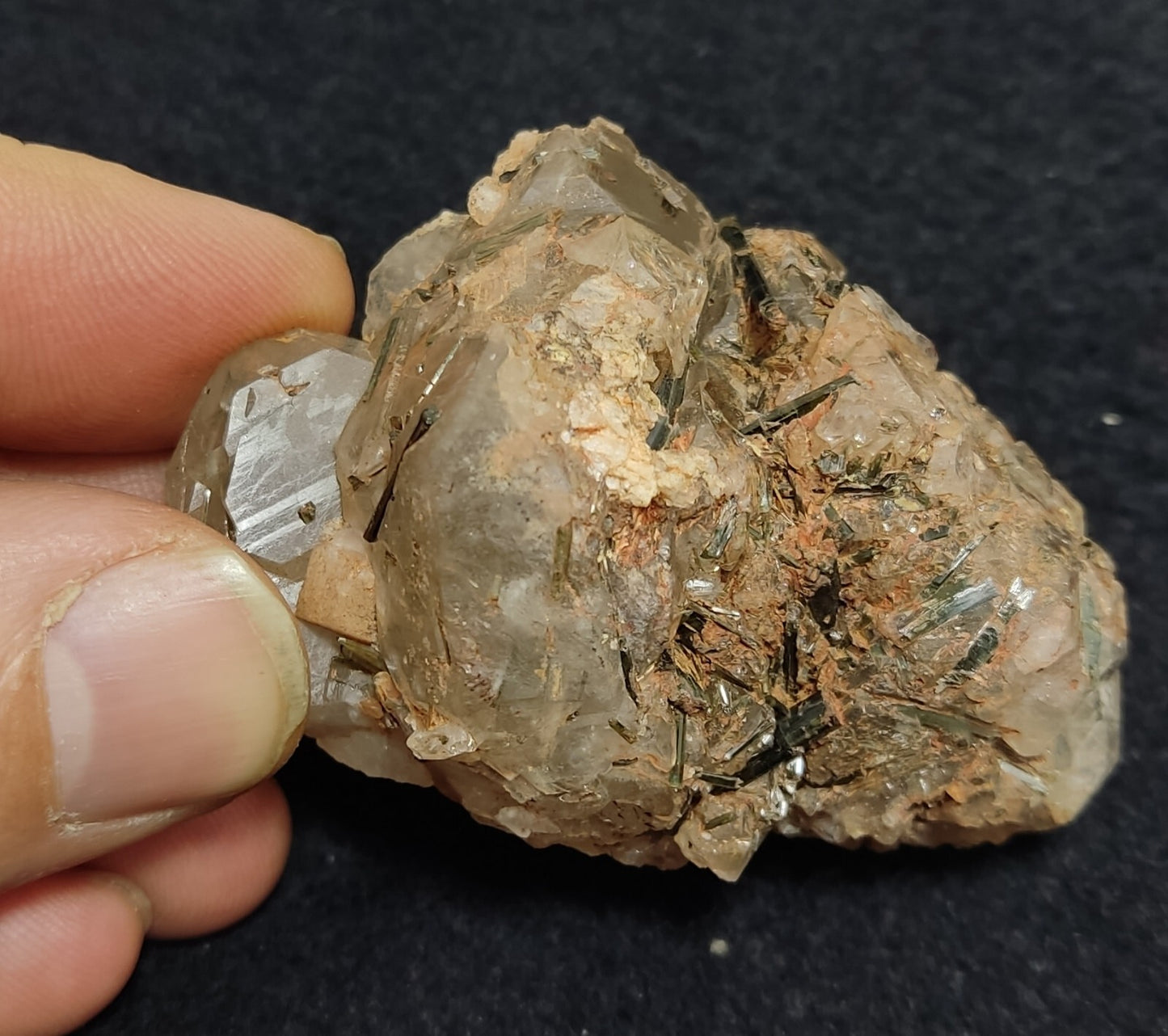 An Aesthetic terminated Quartz floater with aegirine inclusions 98 grams