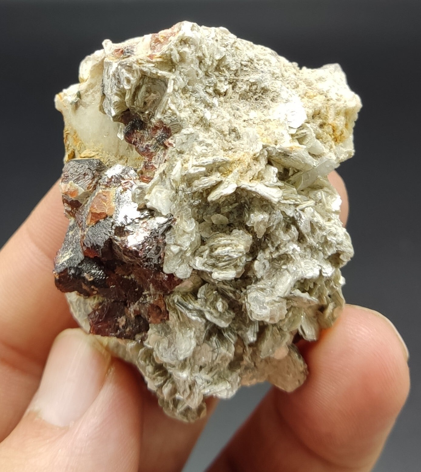 An aesthetic specimen of spessartine garnets on muscovite 58 grams