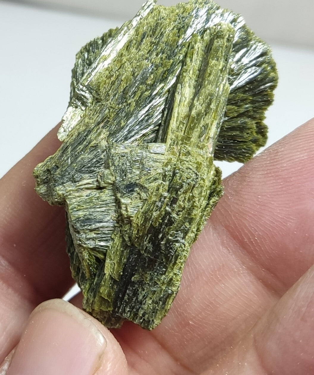 An aesthetic specimen of epidote crystal spray type 29 grams