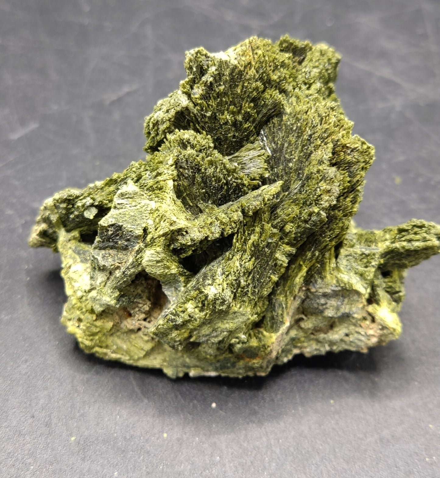 An aesthetic specimen of epidote crystal spray type 107 grams