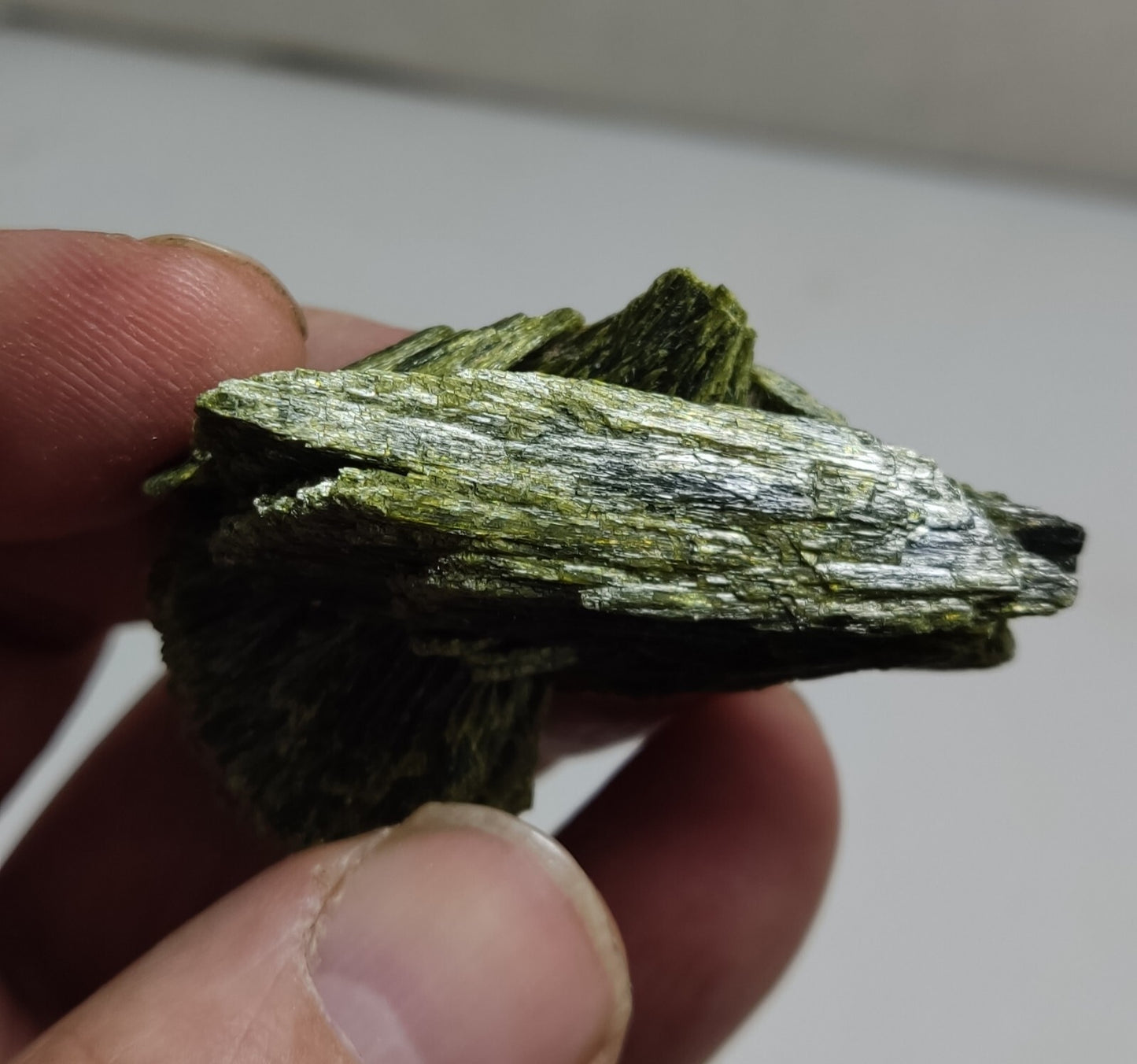 An aesthetic specimen of epidote crystal spray type 29 grams