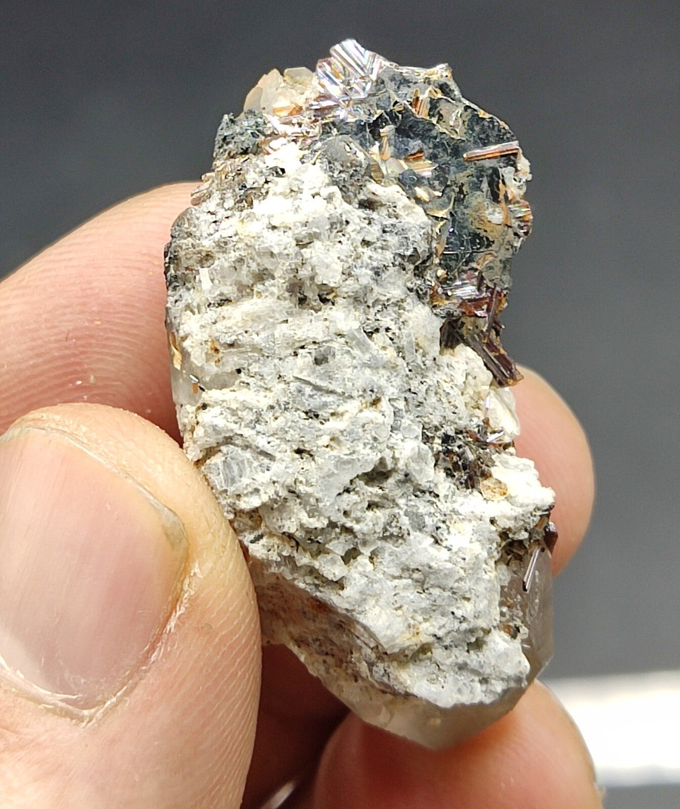 An Aesthetic specimen of quartz crystal with hematite and saginite 16 grams