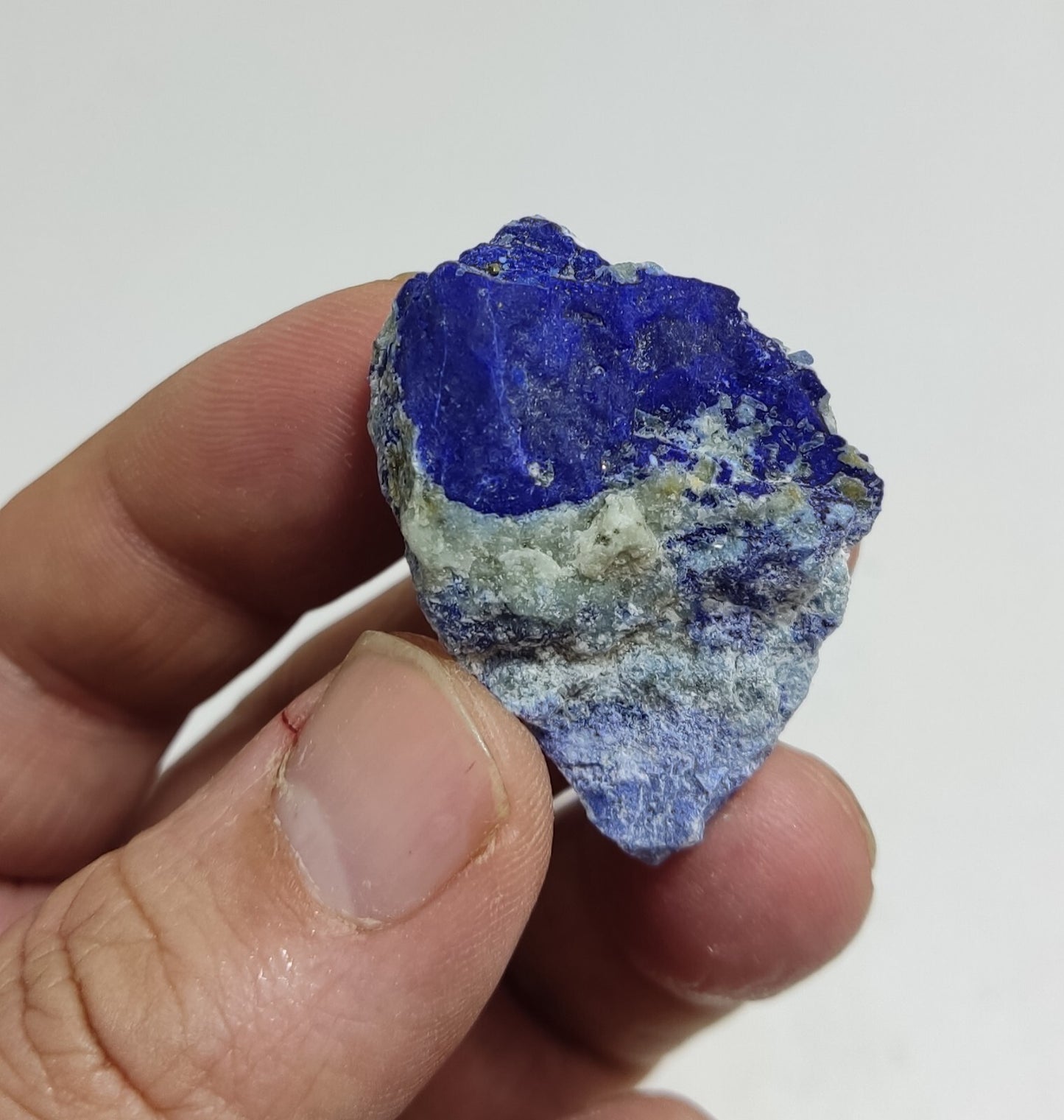 An Aesthetic specimen of fluorescent Lazurite with pyrite 25 grams