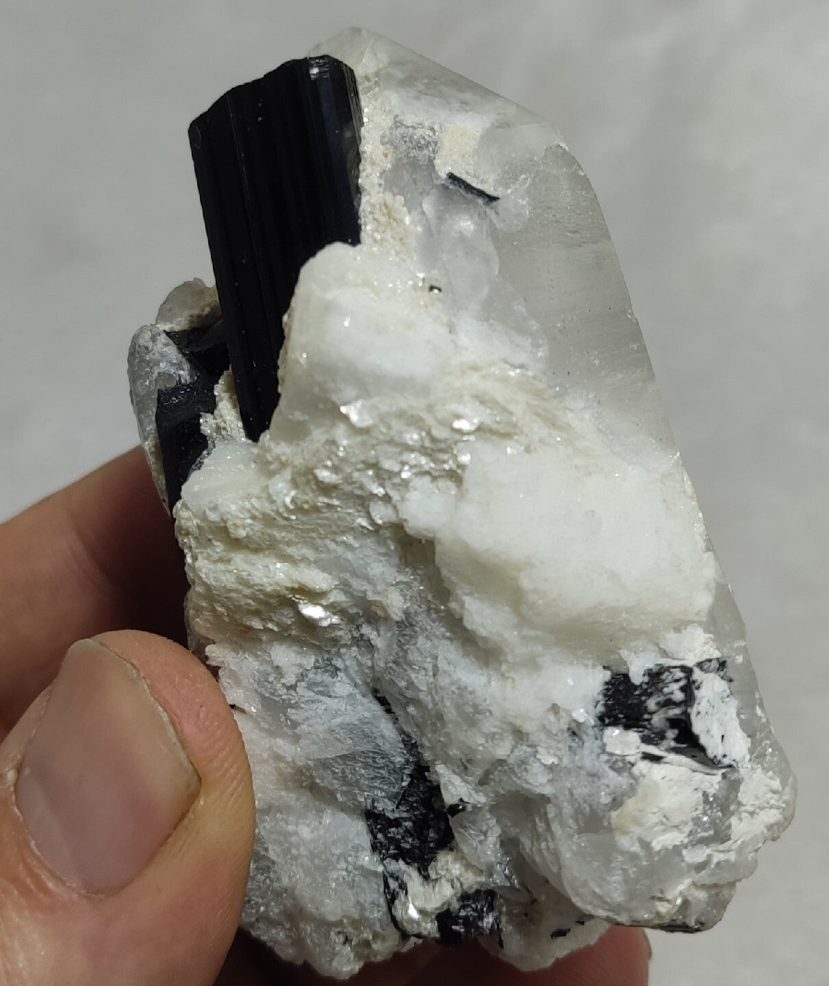 Natural quartz crystal with black tourmaline 145 grams