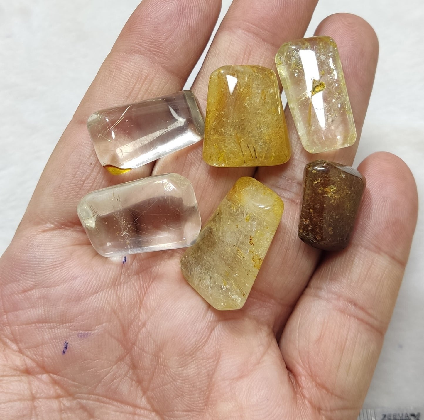 An amazing lot of Rutilated polished quartz tumbles 44 grams