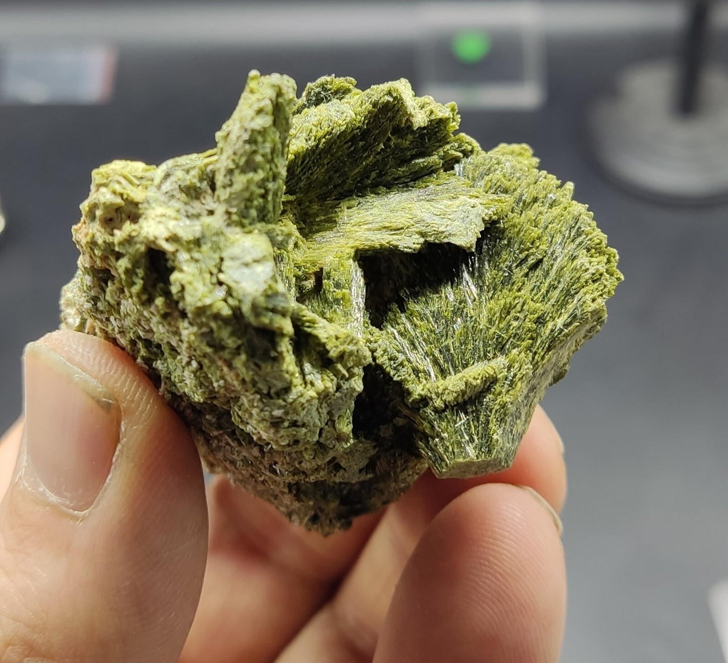 An aesthetic specimen of epidote crystal spray type 107 grams