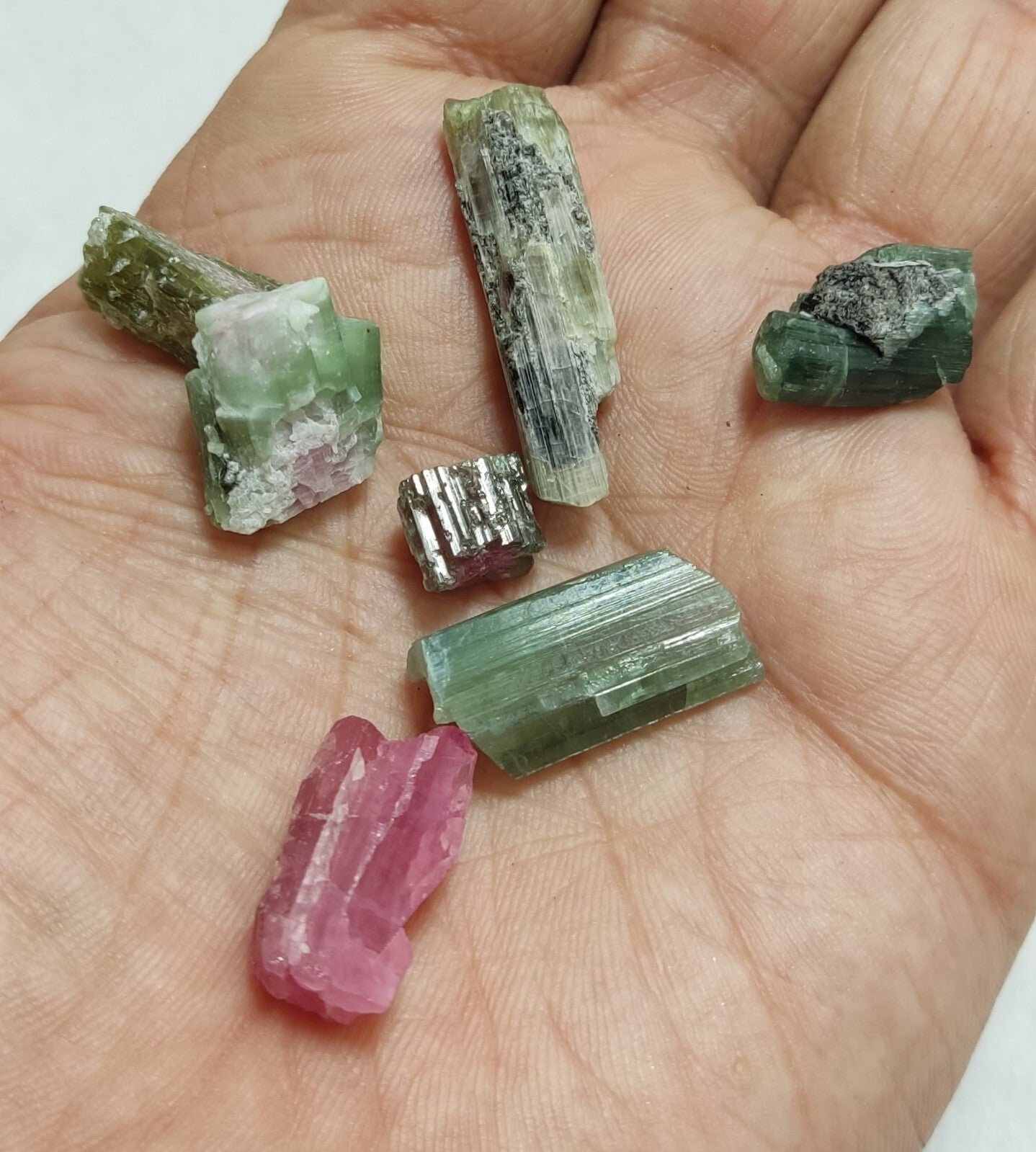 23 grams, 7 tourmaline crystals