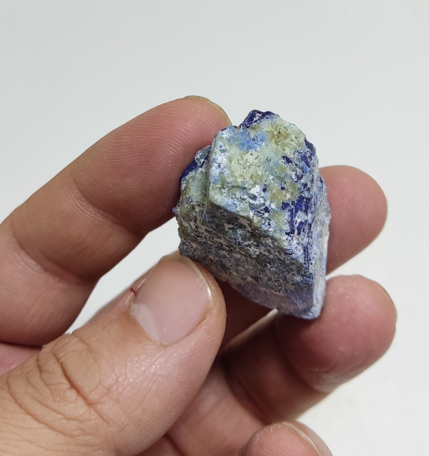 An Aesthetic specimen of fluorescent Lazurite with pyrite 25 grams