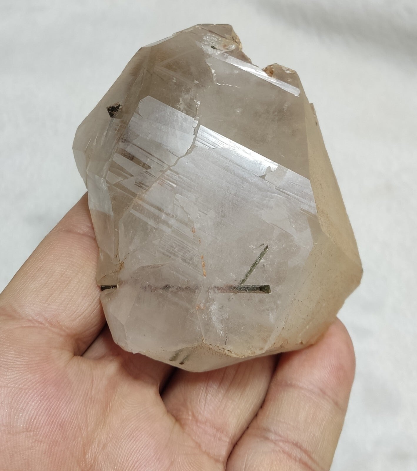 An Aesthetic terminated Quartz floater with needle inclusions 265 grams