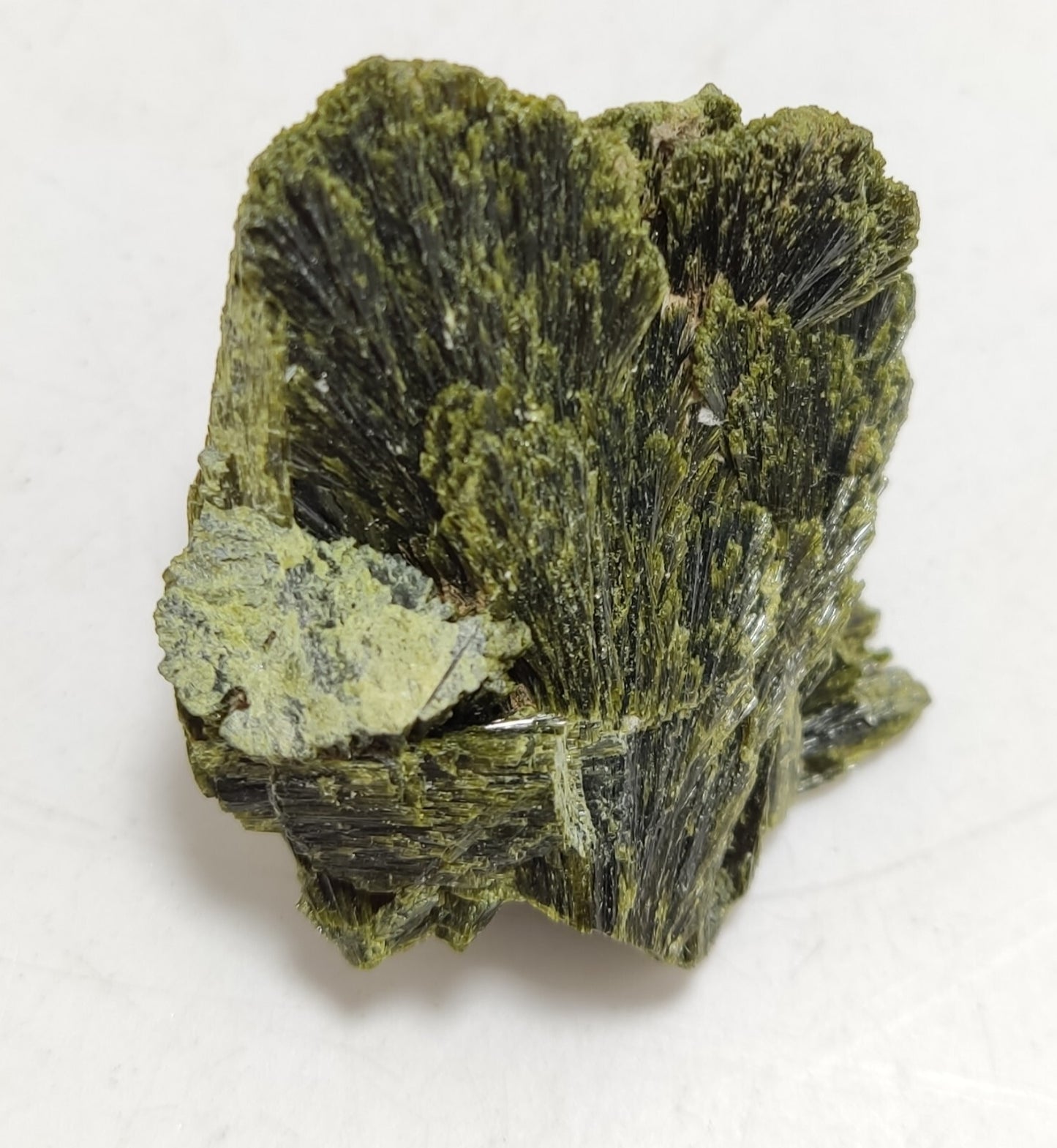 An aesthetic specimen of epidote crystal spray type 31 grams