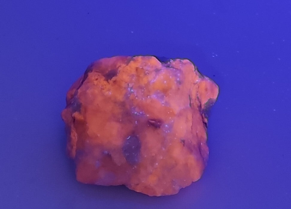 An amazing specimen of hackmanite highly Tenebrescent 143 grams