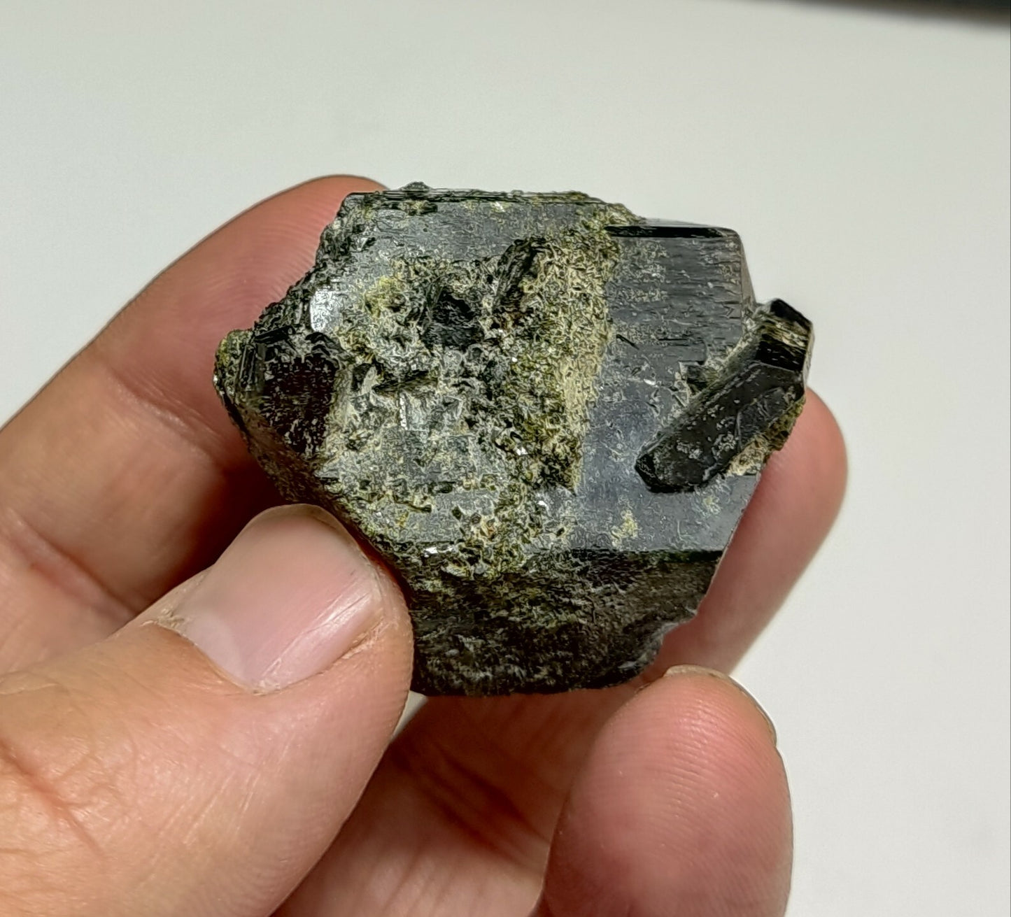 An aesthetic specimen of dark green color Epidote crystals 79 grams