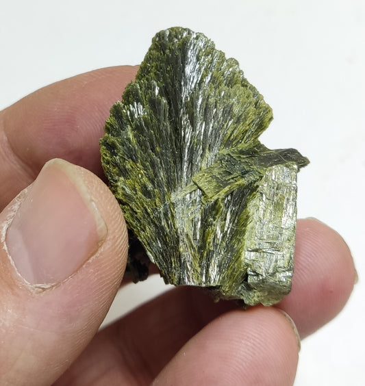 An aesthetic specimen of epidote crystal spray type 27 grams