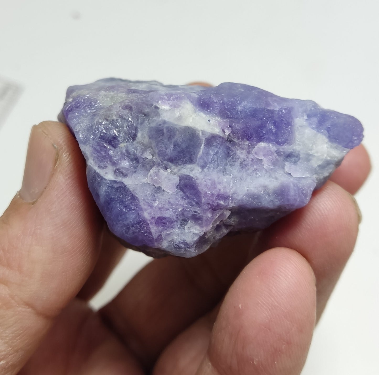 An amazing specimen of hackmanite highly Tenebrescent 143 grams