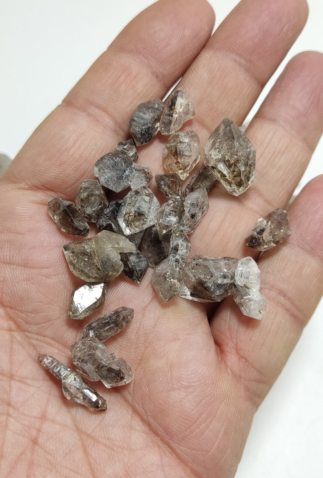 105 grams carbon included quartz crystals