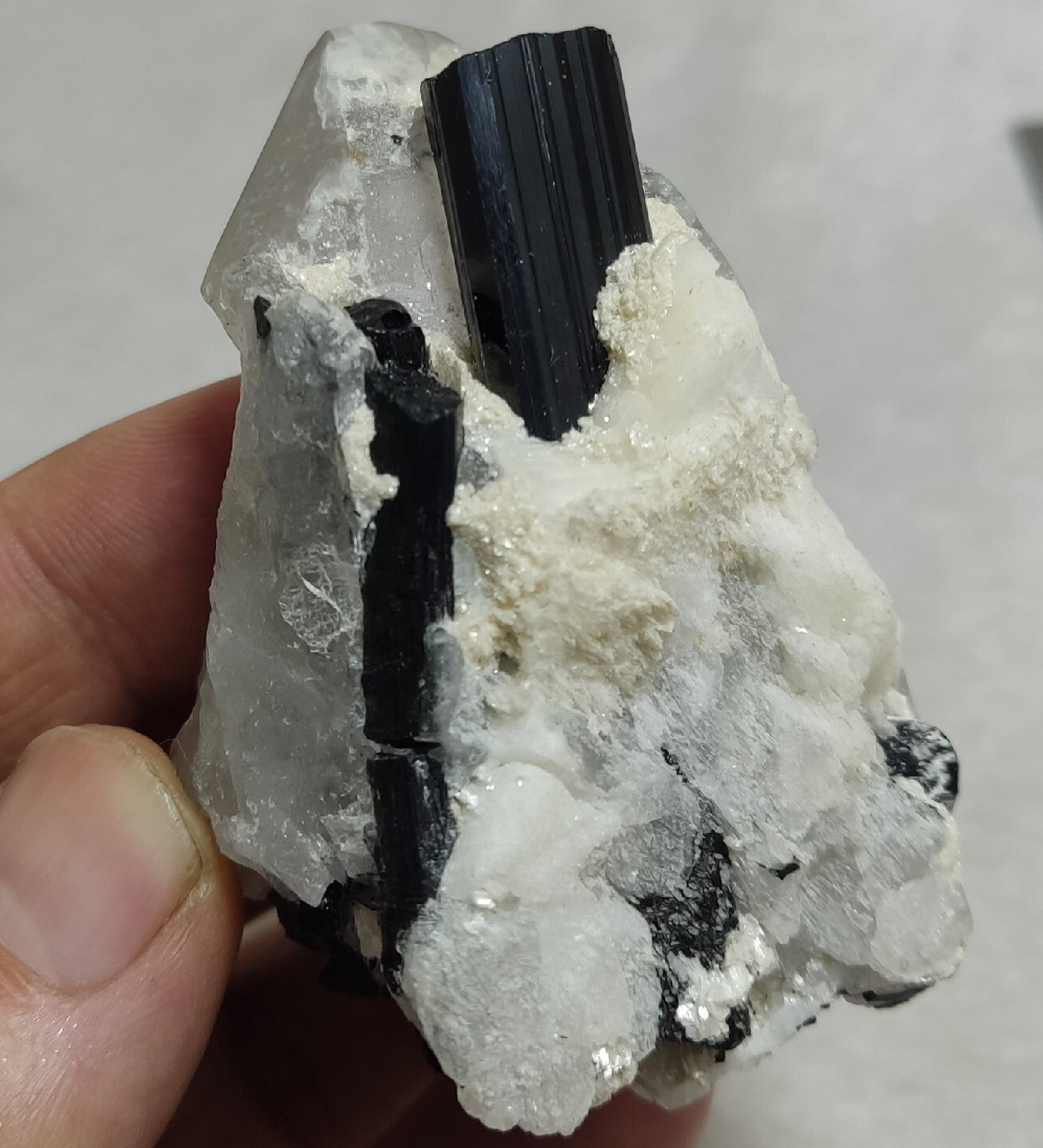 Natural quartz crystal with black tourmaline 145 grams