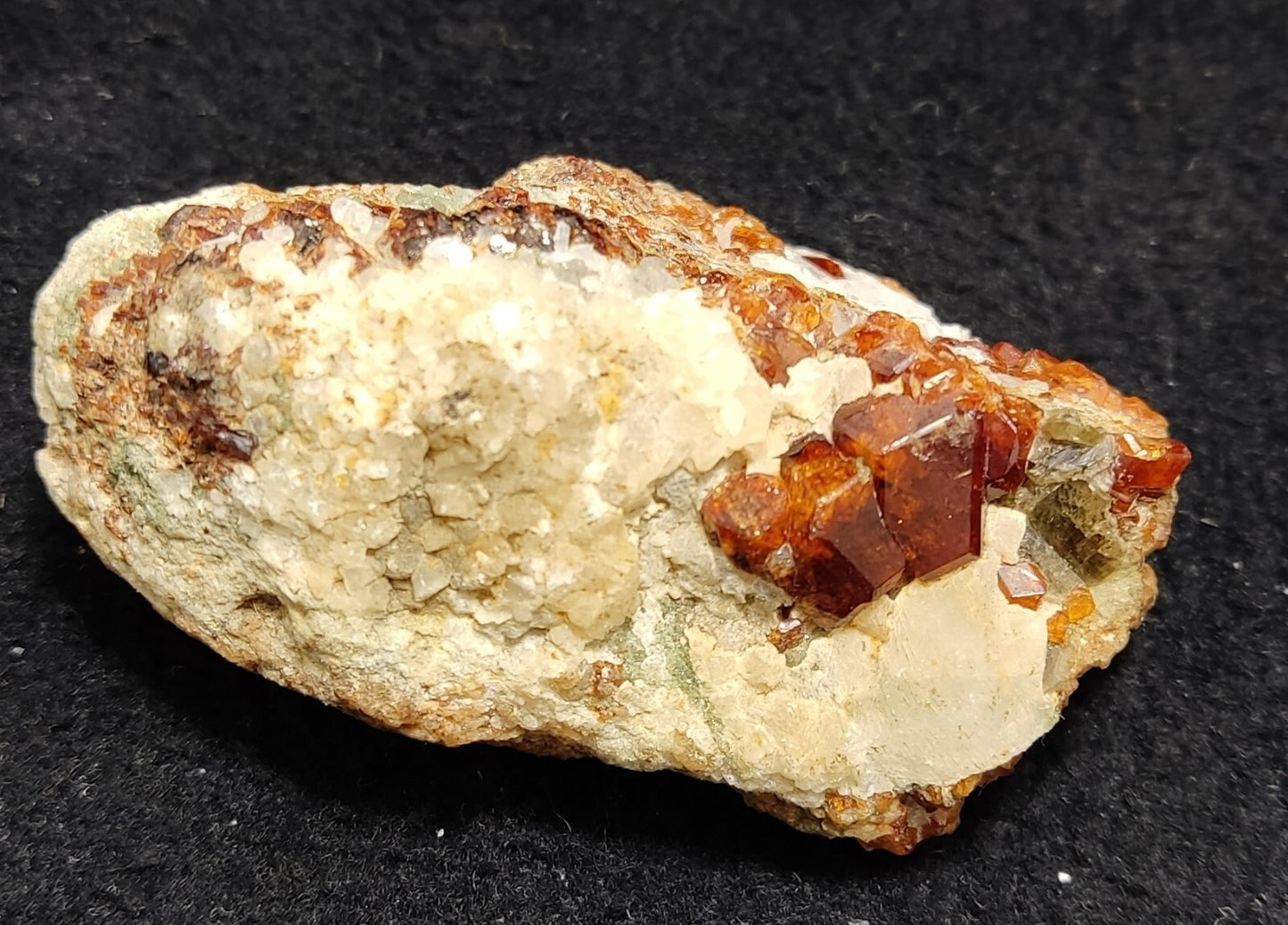 An Aesthetic specimen of hessonite garnets on matrix 132 grams
