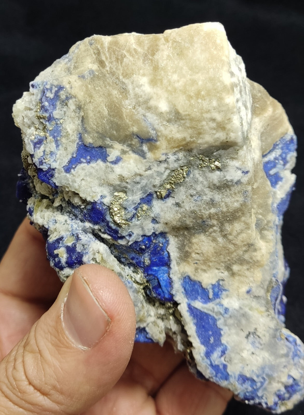 An Aesthetic specimen of fluorescent Lazurite with pyrite 489 grams