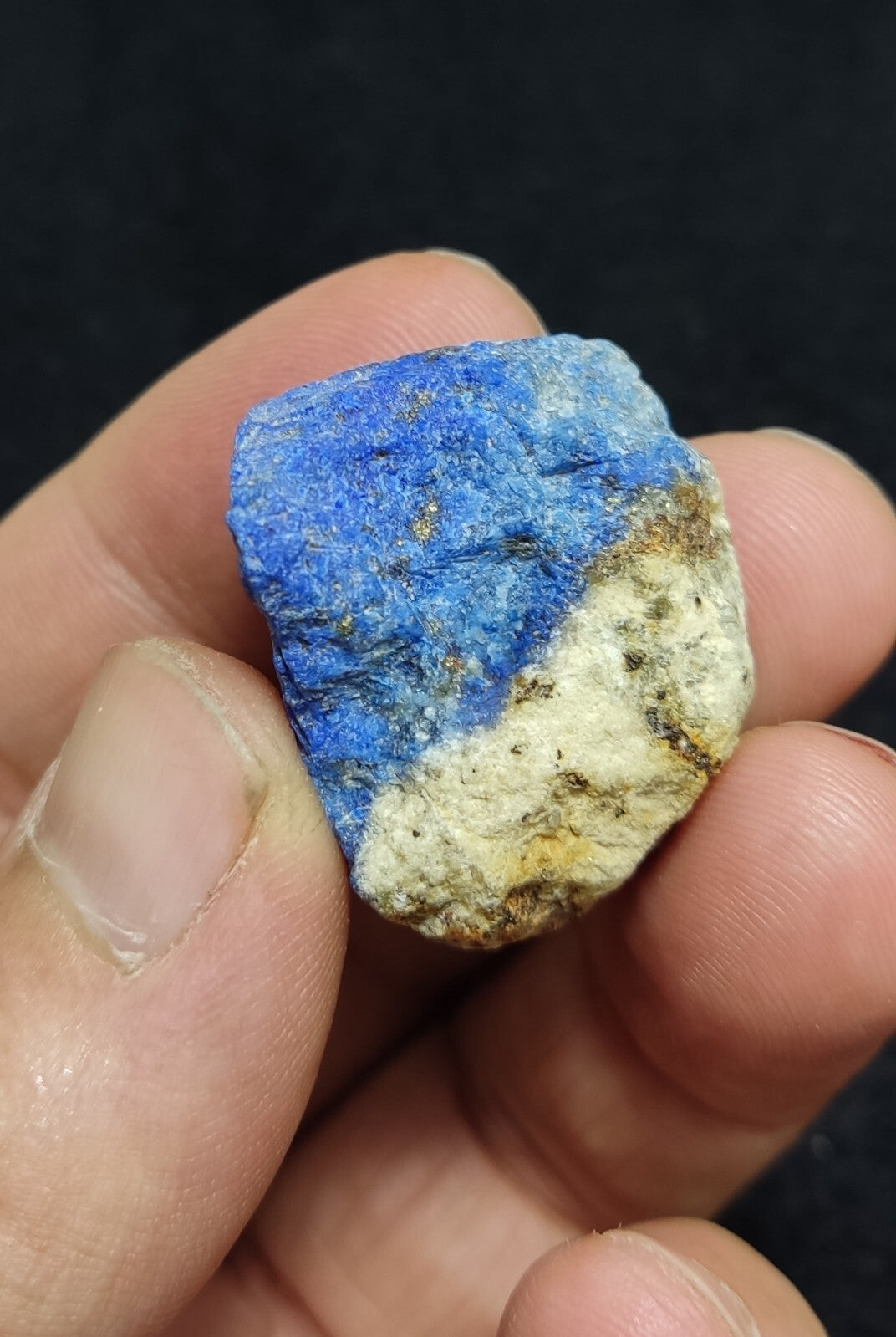 An Aesthetic specimen of fluorescent lapis/lazurite on matrix 23 grams