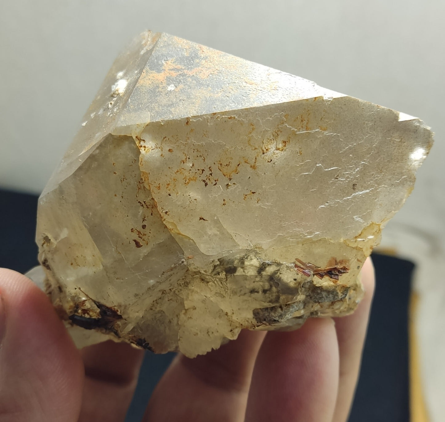 An Aesthetic terminated Quartz floater with rutiles and hematite 399 grams