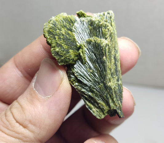 An aesthetic specimen of epidote crystal spray type 29 grams