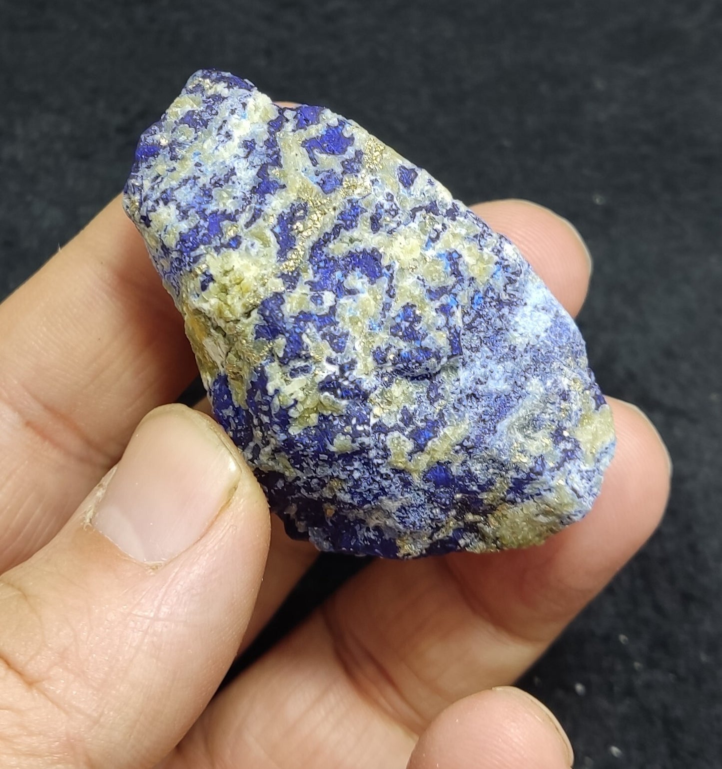 An Aesthetic specimen of fluorescent Lazurite with pyrite 65 grams