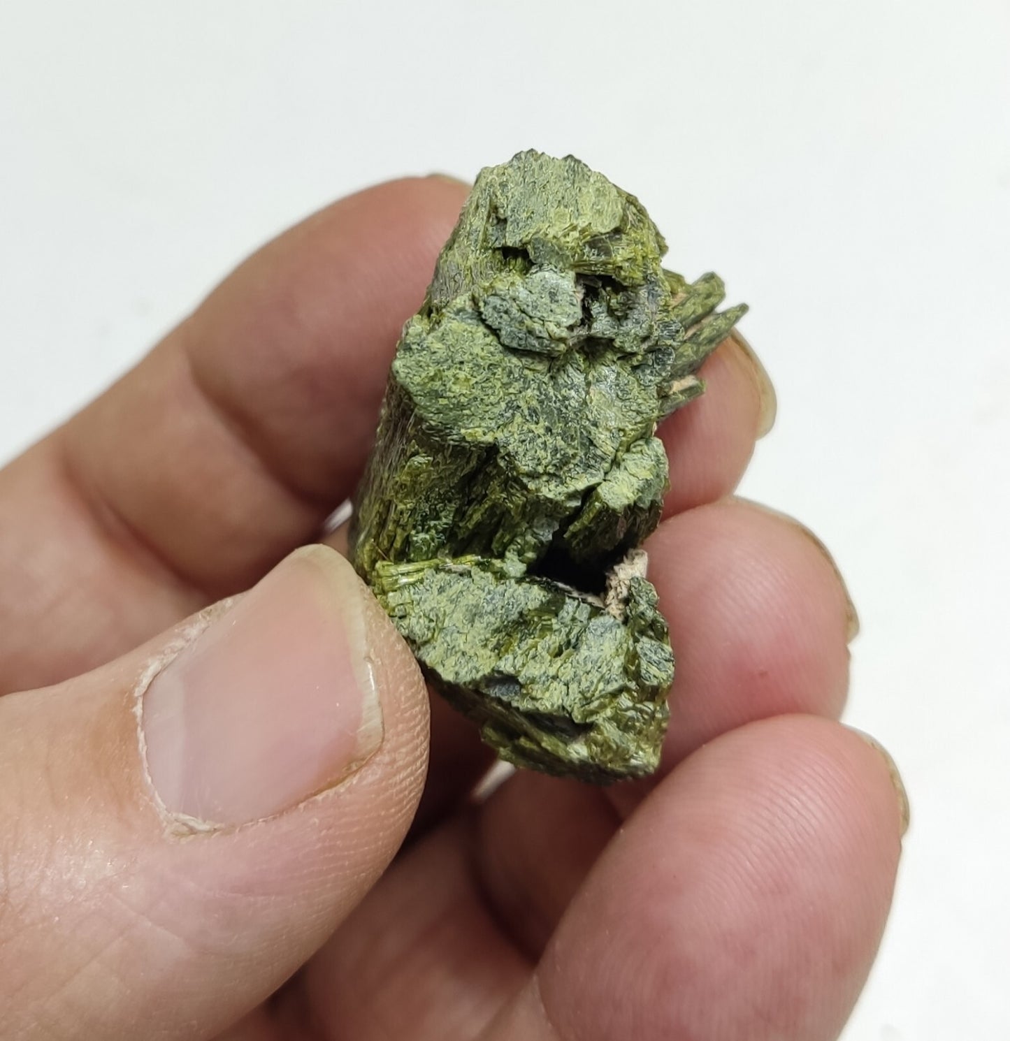 An aesthetic specimen of epidote crystal spray type 27 grams
