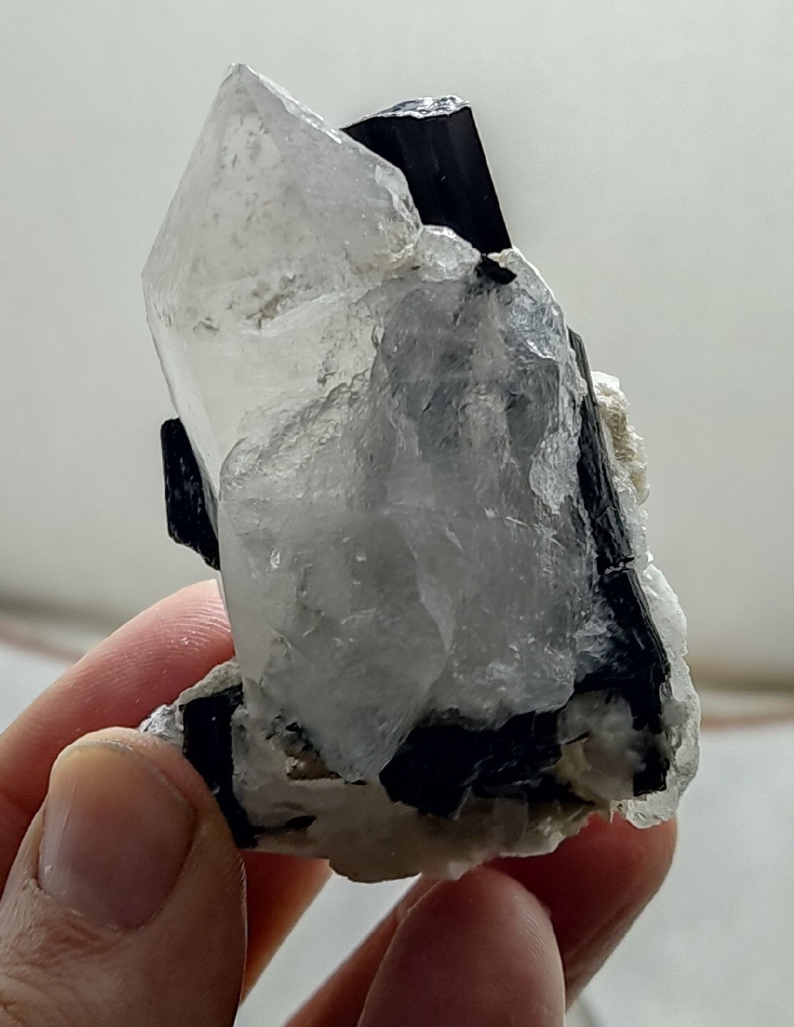 Natural quartz crystal with black tourmaline 145 grams