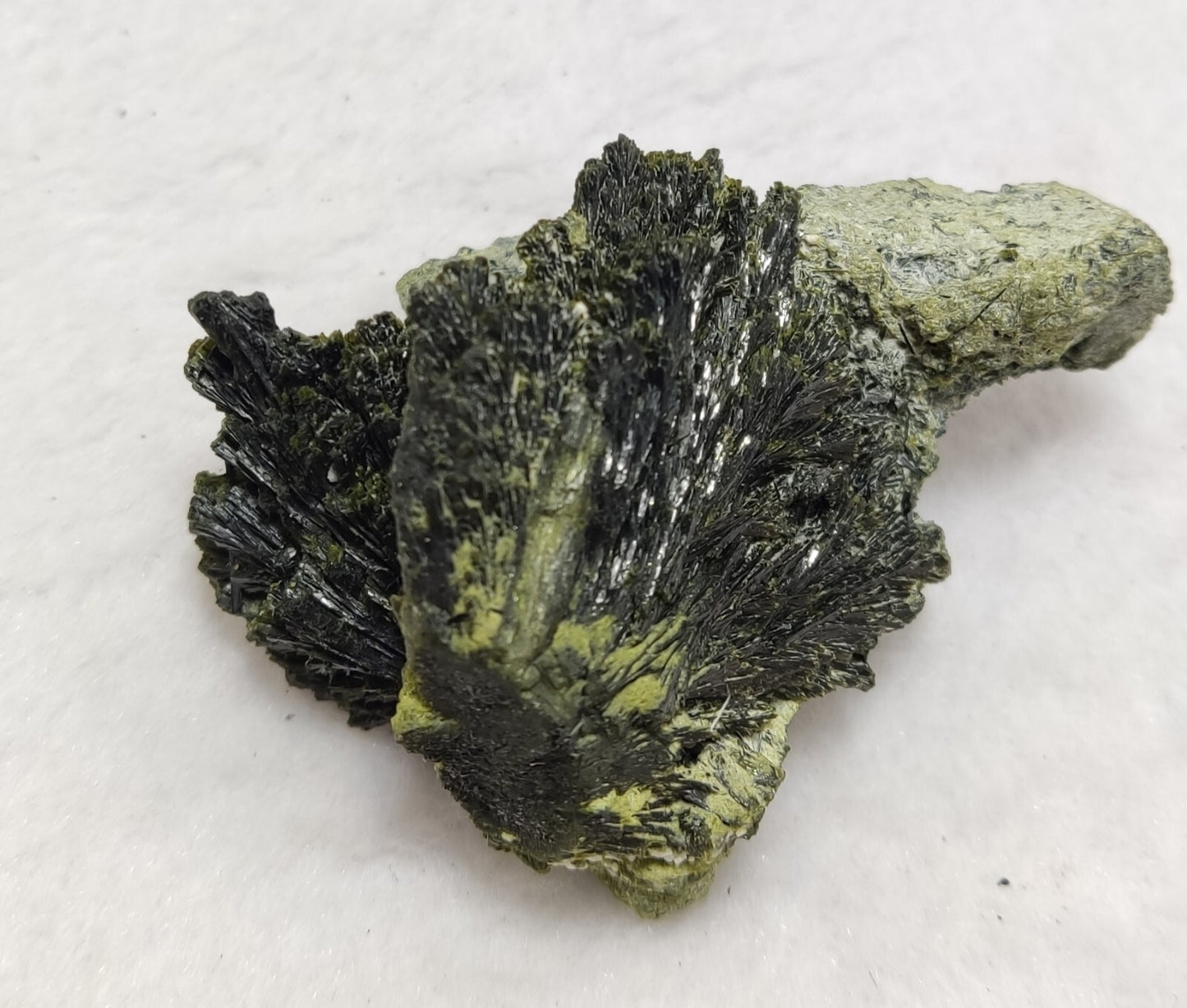 An aesthetic specimen of epidote crystal spray type 66 grams
