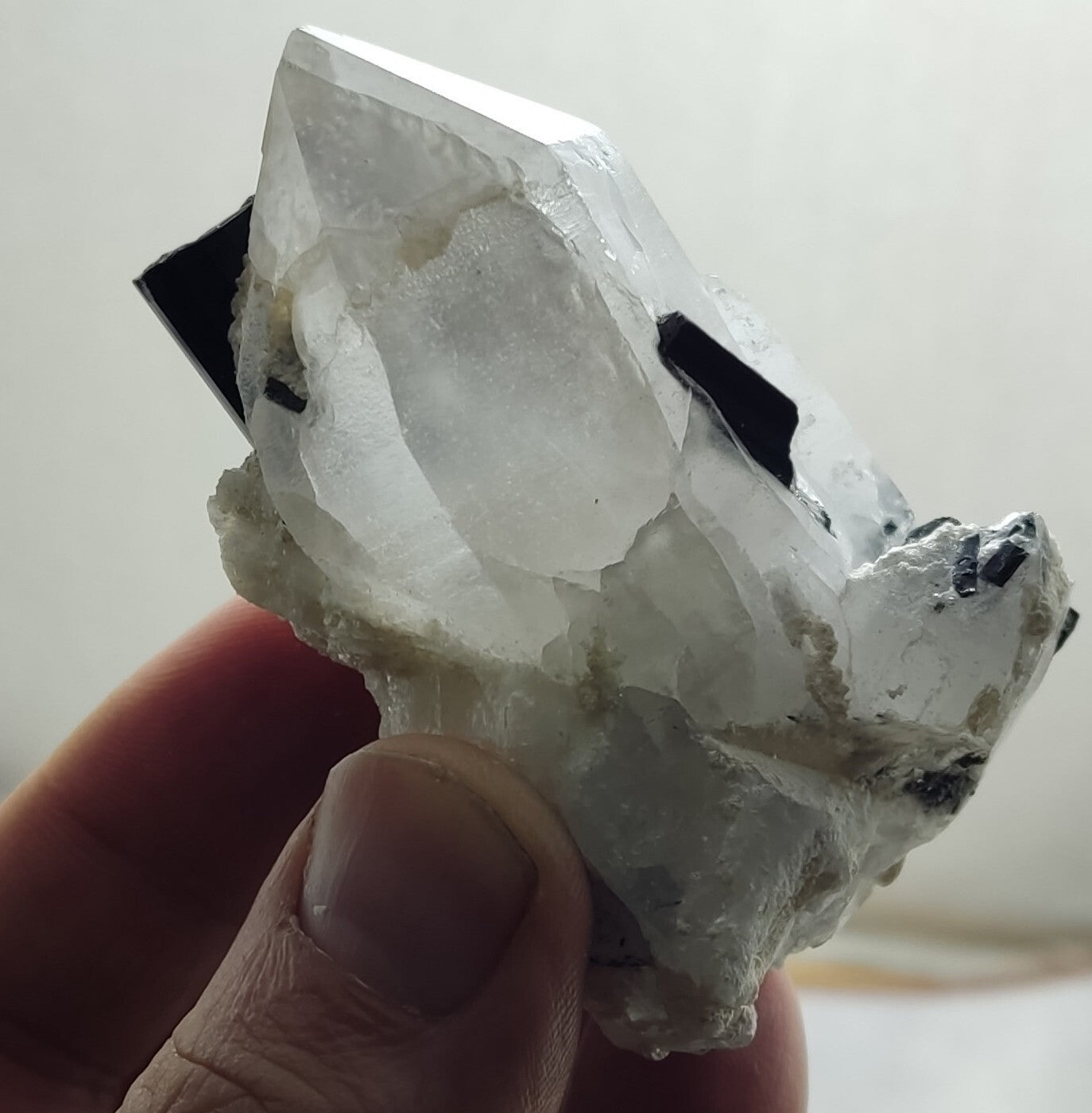 Natural quartz crystal with black tourmaline 145 grams