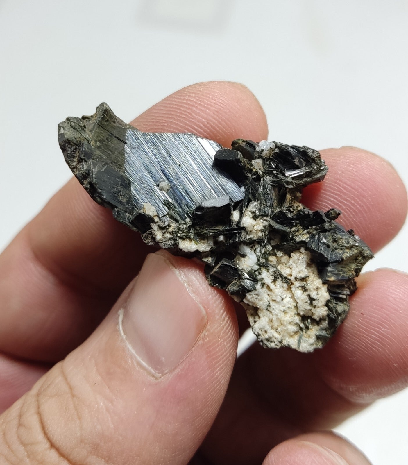 An aesthetic specimen of terminated aegirine crystal cluster 13 grams