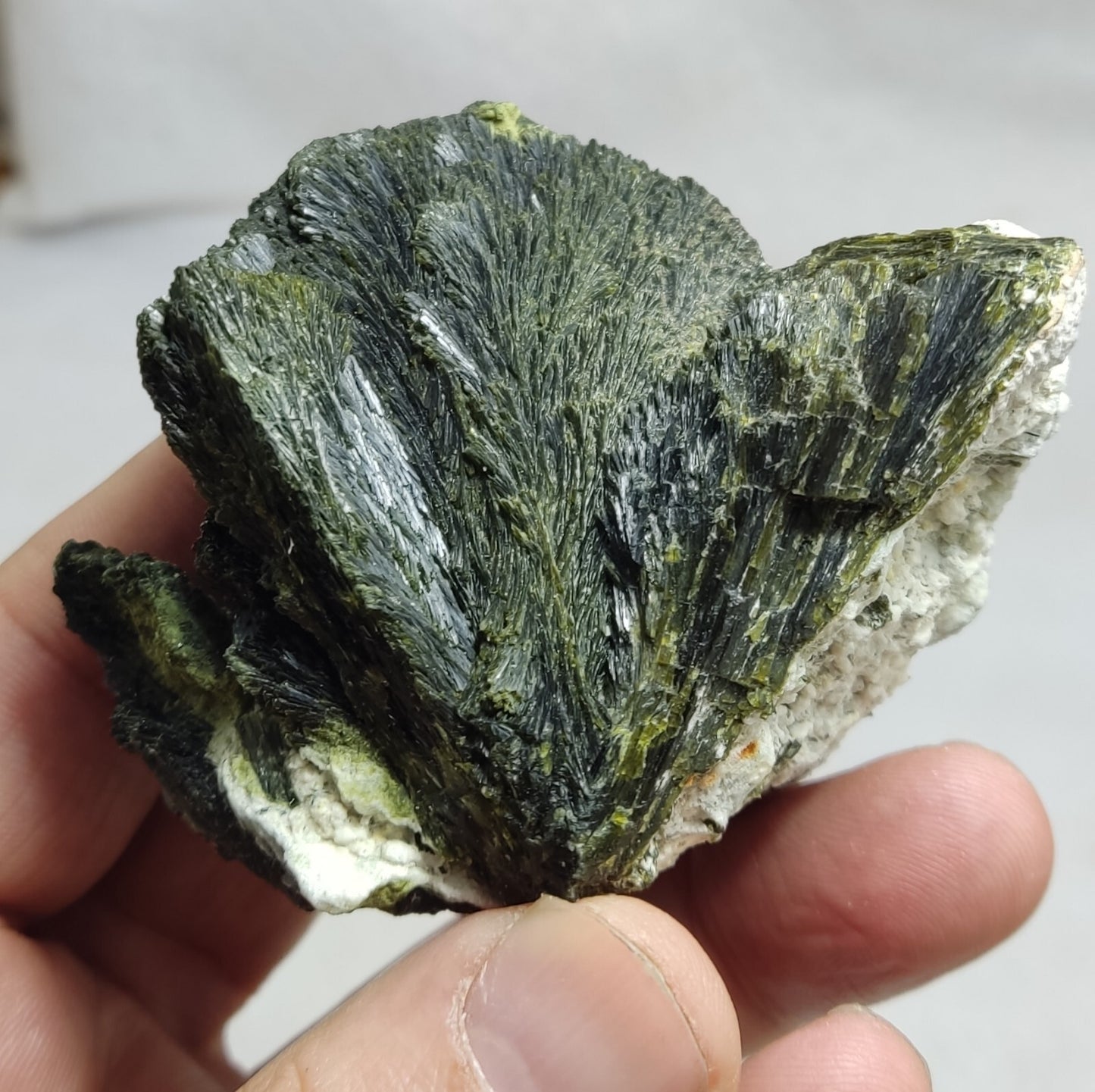 An aesthetic specimen of epidote crystal spray type on matrix 182 grams