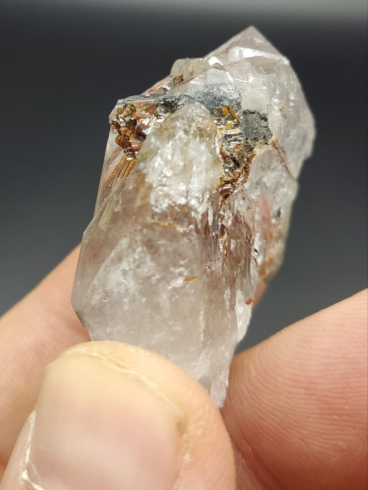 An aesthetic specimen of quartz with hematite and rutile inclusions 28 grams
