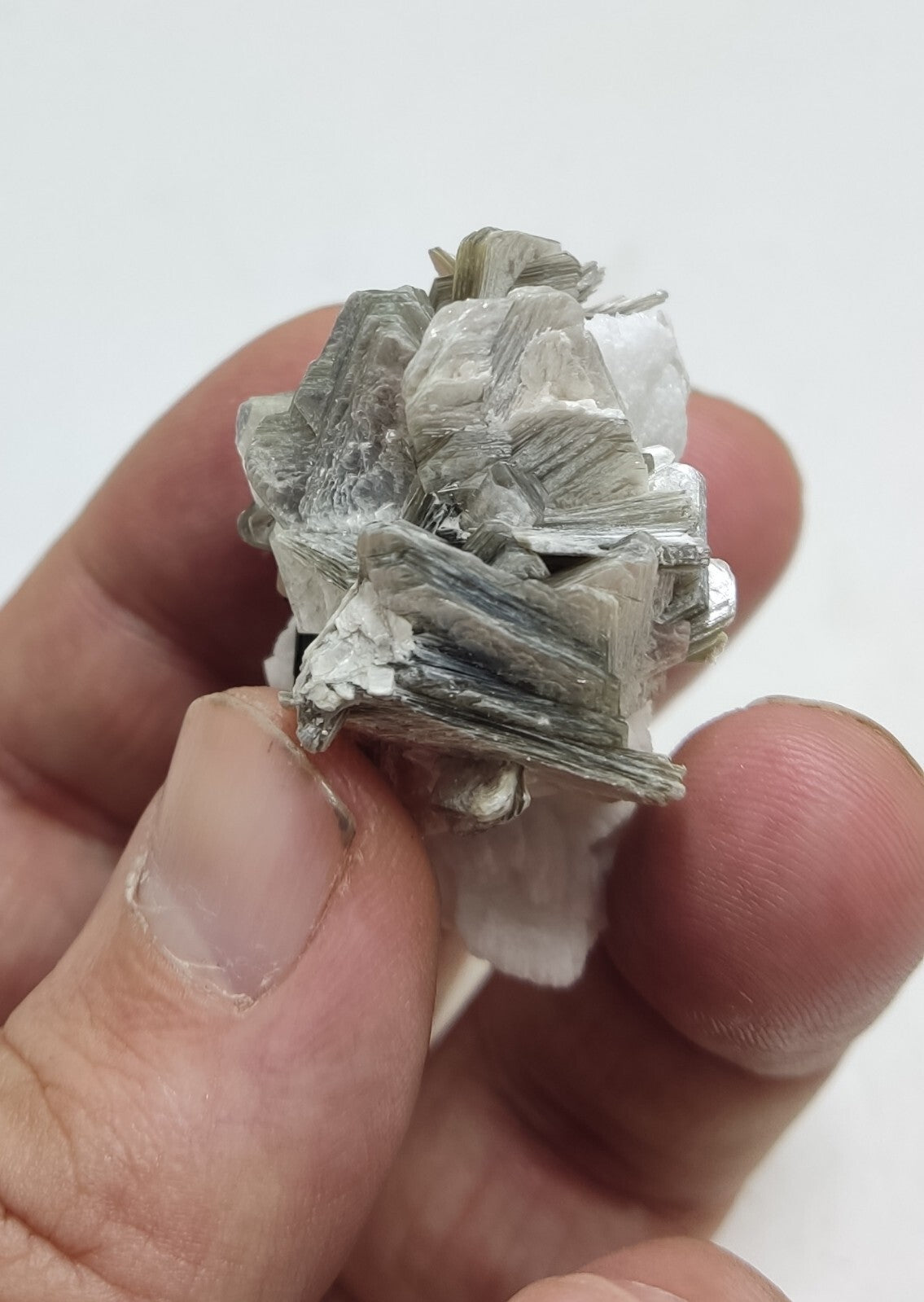 An Aesthetic specimen of muscovite with Tourmaline and albite 40 grams