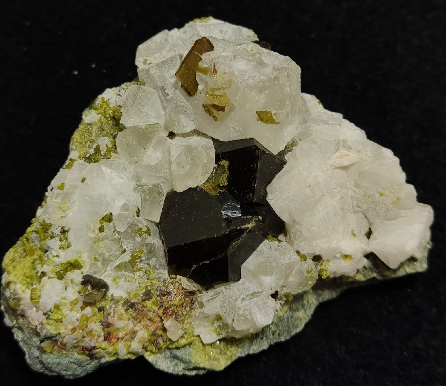 Andradite garnets on matrix with epidote and calcite 91 grams