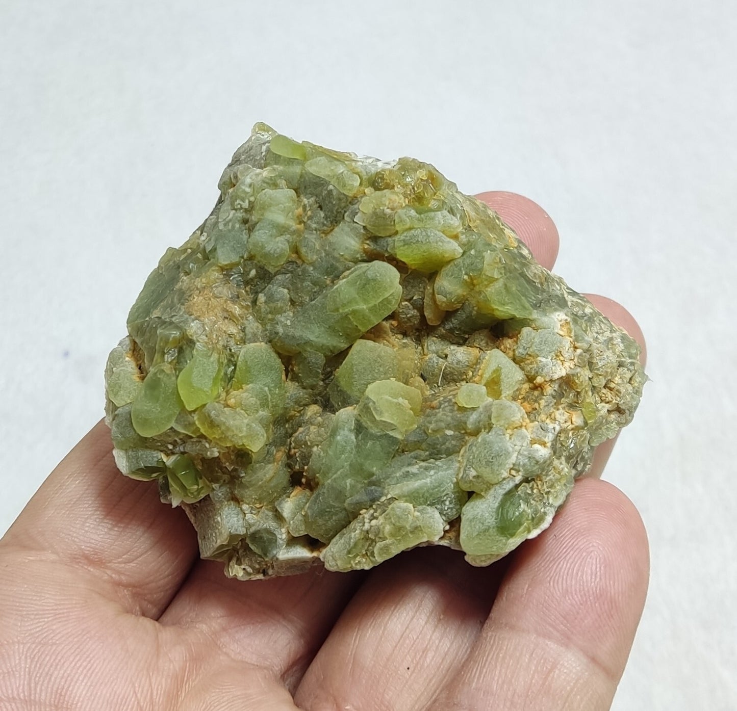 An Aesthetic terminated specimen of peridot 180 grams
