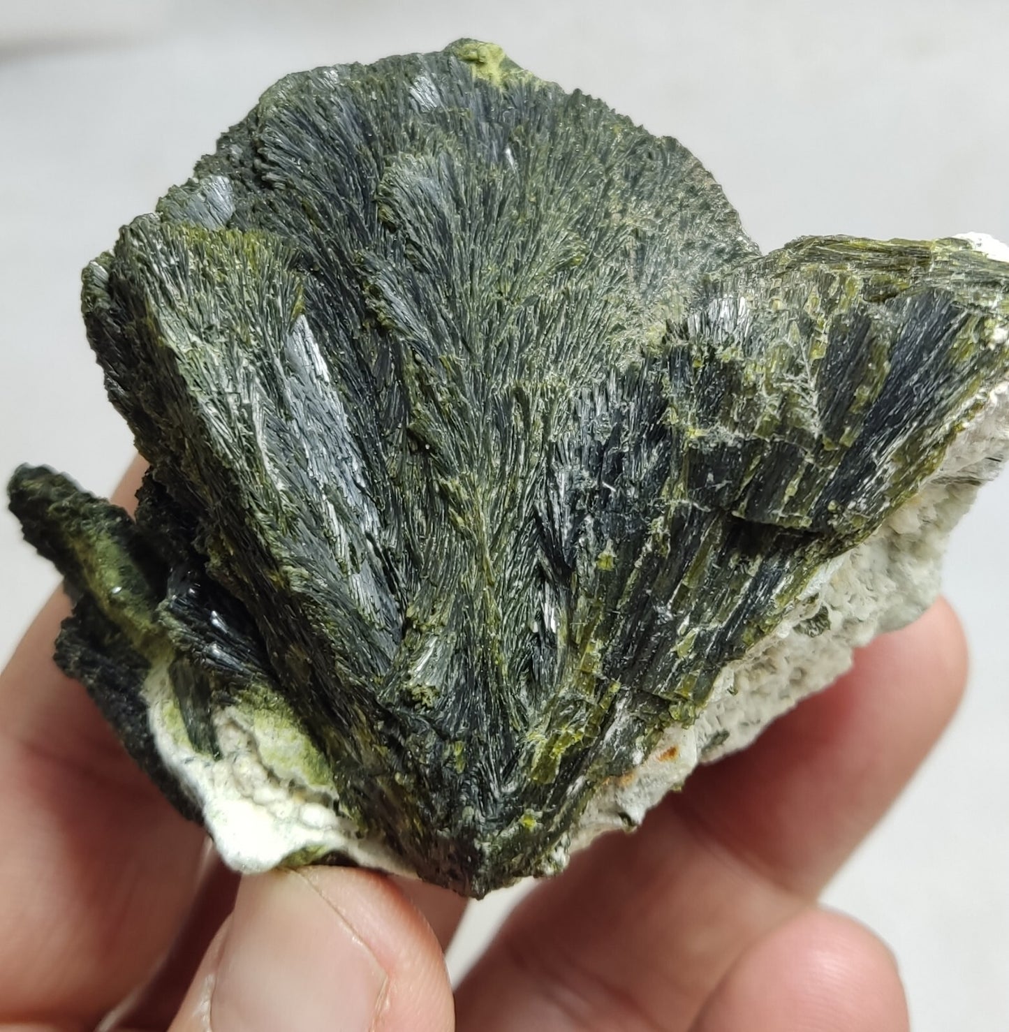 An aesthetic specimen of epidote crystal spray type on matrix 182 grams