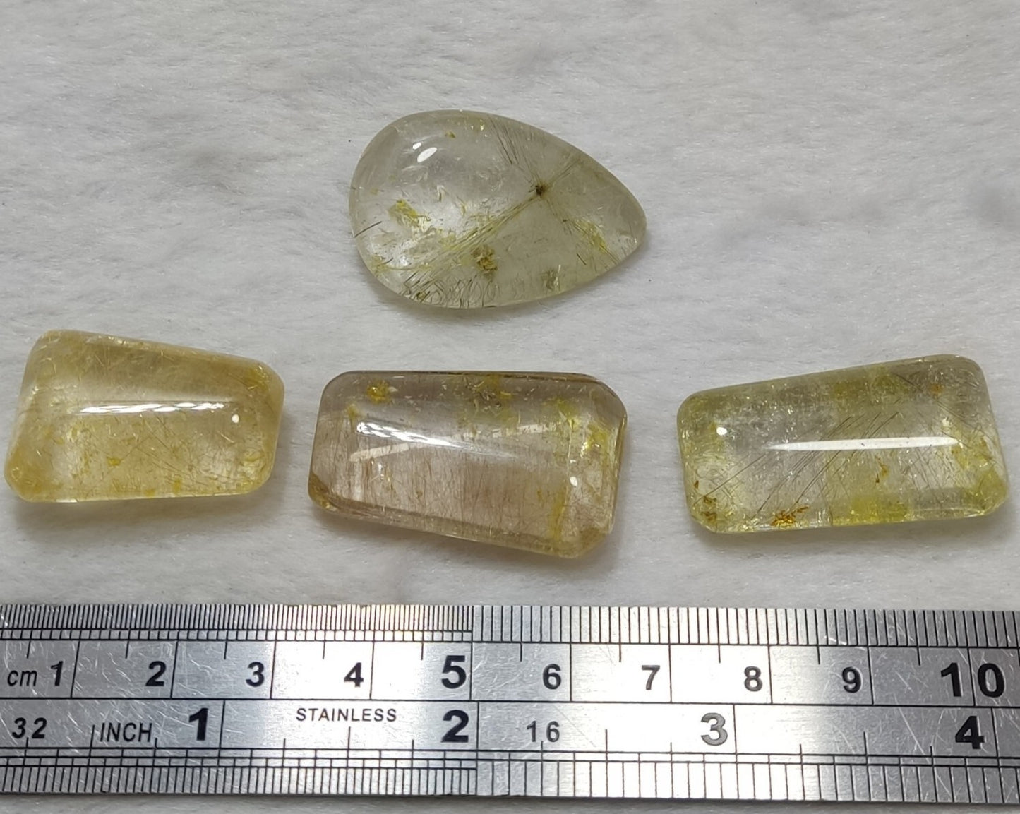 An amazing lot of Rutilated polished quartz tumbles 45 grams