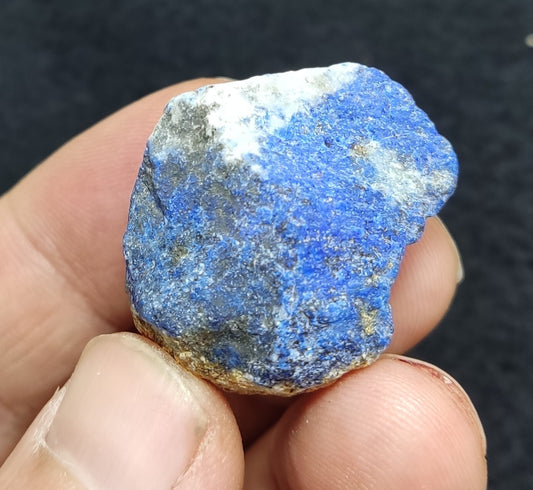 An Aesthetic specimen of fluorescent lapis/lazurite on matrix 23 grams